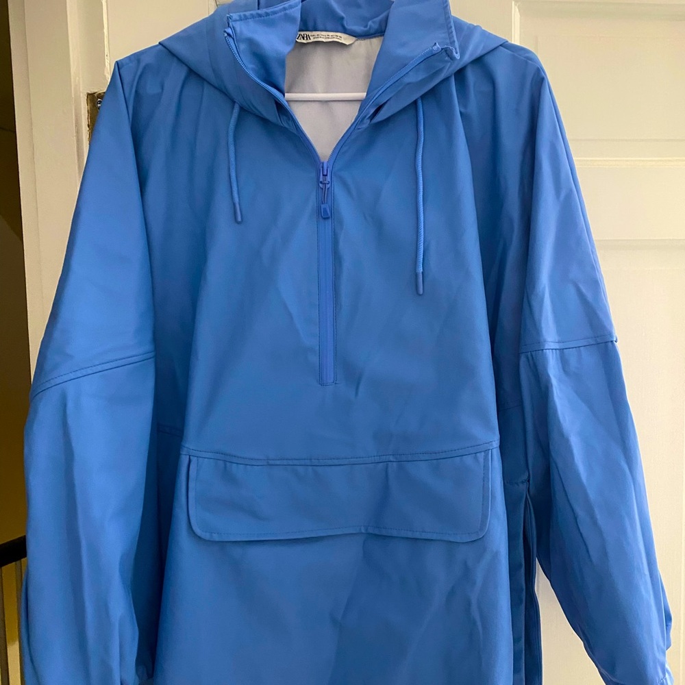 Blue Rain Anorak from Zara. Oversized chic rain option with center pocket.